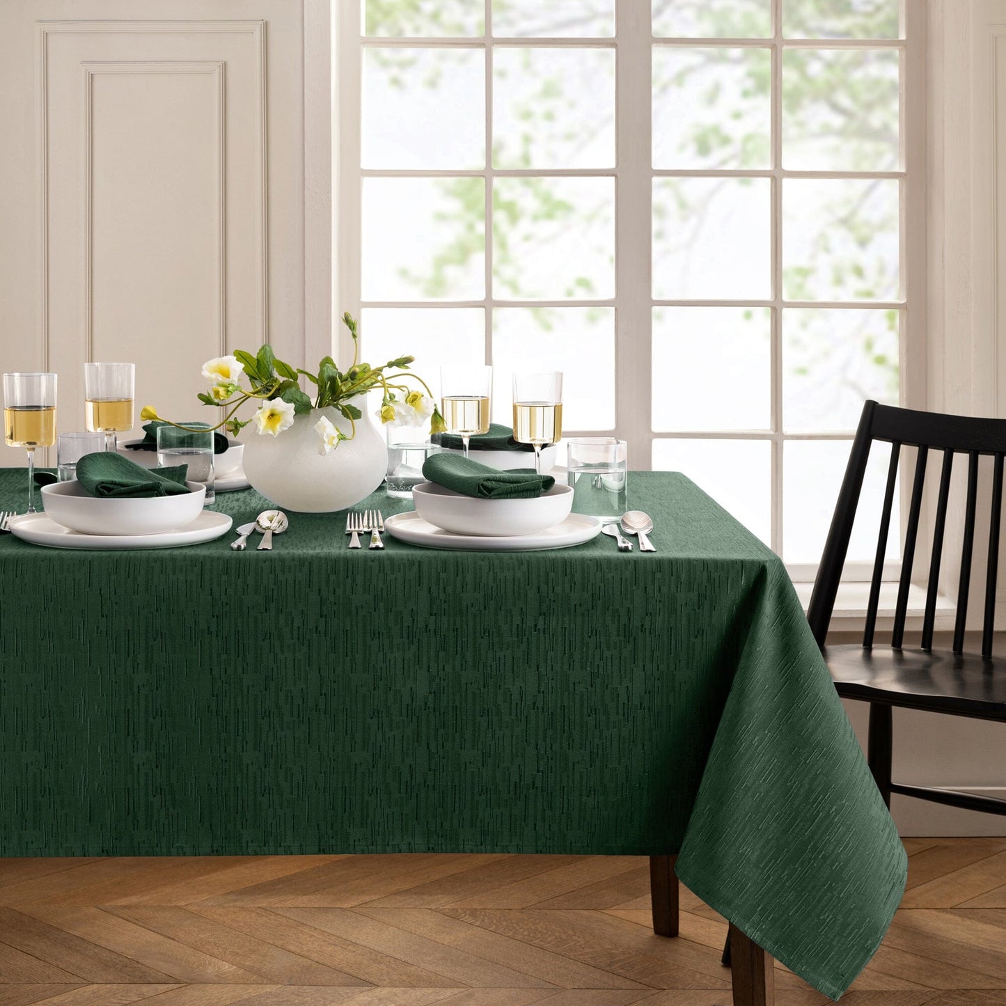Mantel continental resistente al agua y a las manchas de textura sólida