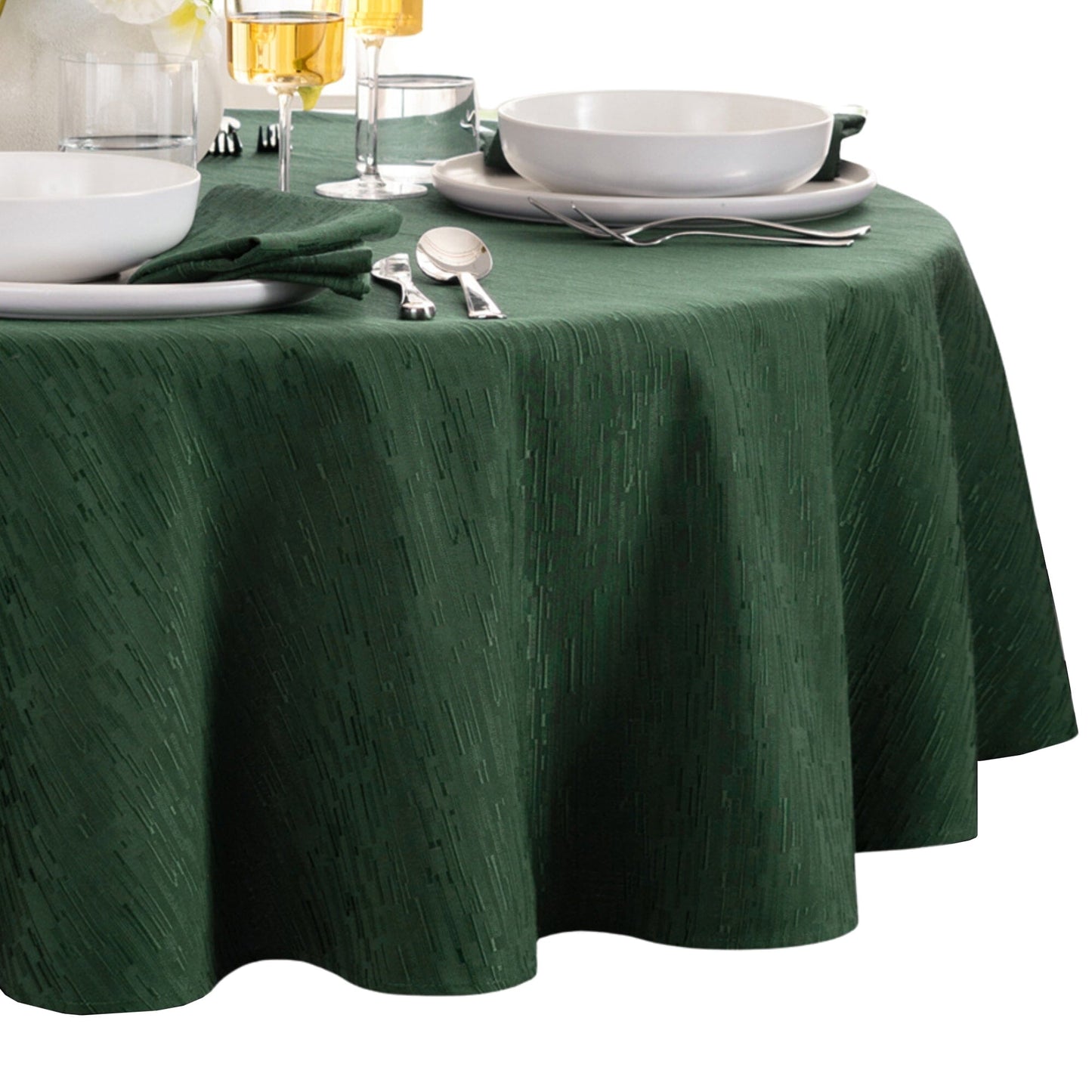 Mantel continental resistente al agua y a las manchas de textura sólida